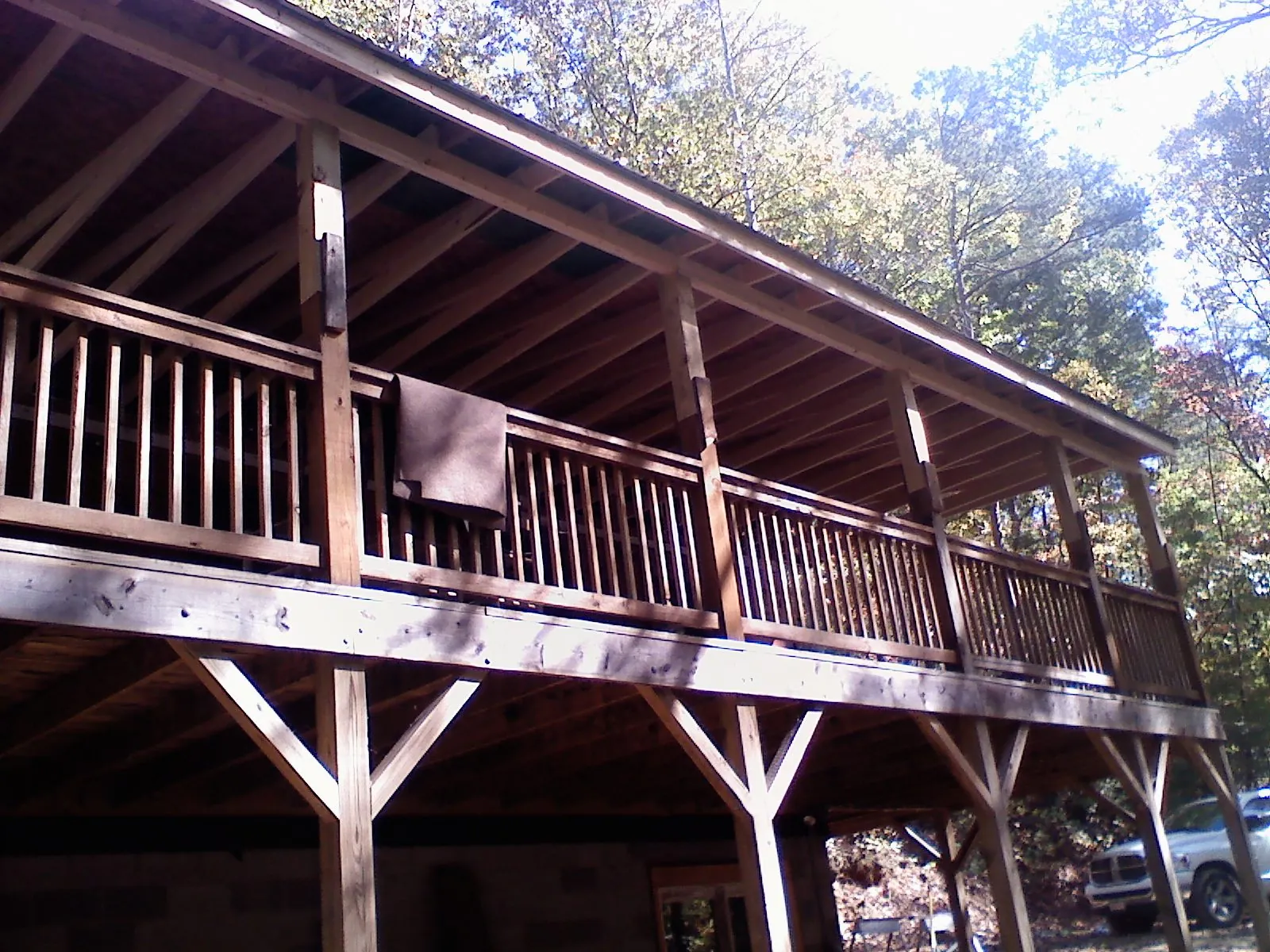 Timber framing under a new elevated porch and deck — Roof Leak Repair in Willow Springs by Roofing Brothers